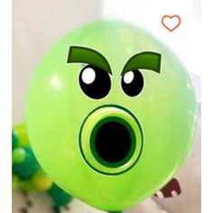 a green balloon with an angry face drawn on it's side and the caption says i love you