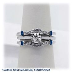 two wedding rings with blue and white bands on each band, set in 18k white gold