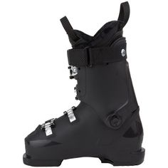 a pair of ski boots with straps and buckles on the bottom, in black