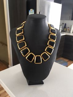 "Beautiful Anne Klein statement necklace. Modernist design in a shiny gold tone and black enamel featuring a toggle closure. CONDITION In excellent vintage condition. No wear, marks or damage. Closures are all secure The necklace measures approximately 17 3/4 inches and 1 1/8\" wide. The necklace is signed with © Anne Klein on one side of the tag and the lion's head on the underside. The necklace is also signed ©AK on a cartouche on one link. It is in excellent vintage condition Please see this Modern Gold Necklace With Black Enamel, Vintage Black Enamel Necklaces For Evening, Vintage Black Enamel Necklace For Evening, Formal Gold-tone Metal Toggle Necklace, Retro Black Metal Necklace, Black Luxury Metal Chain Necklace, Formal Black Enamel Necklaces, Luxury Black Metal Chain Necklace, Formal Black Enamel Necklace