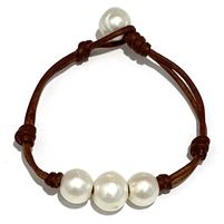 photo of Wendy Mignot Daisy Three Pearl Freshwater Pearl and Leather Bracelet Handmade Adjustable Luxury Pearl Bracelet, Elegant Handmade Leather Bracelet, Handmade Elegant Leather Bracelet, Elegant Round Adjustable Leather Bracelet, Gypset Style, Ankle Bracelets Diy, Pearl Anklet, Bracelets Diy, Freshwater Pearl Necklaces