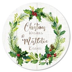 christmas wishes and mistle kisses sticker on a white background with holly wreaths