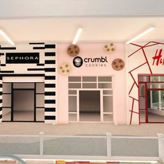 the interior of a crumbl cookies shop with black and white stripes on the wall