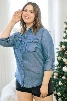 Say hello to the softest button up denim shirt you'll own! This one is a true closet work horse. It's full length sleeves can be rolled and securely fastened with the attached button tabs. The fully buttoned center front means she can double as a light jacket too! Not to mention the perfect shade of faded denim blue and the gloriously soft tencel fabric! Grab this one and start working her into the rotation now! 100% Tencel (zero stretch, if in between sizes or would like an oversized look go up Medium Wash Button-up Denim Top With Buttoned Pockets, Denim Blue Long Sleeve Shirt With Button Closure, Dark Wash Long Sleeve Shirt With Buttons, Fitted Button-up Denim Top For Everyday, Light Wash Long Sleeve Denim Top With Buttons, Dark Wash Long Sleeve Denim Top For Work, Long Sleeve Denim Top With Buttons, Fall Washed Blue Denim Top With Button Closure, Denim Blue Button-up Top With Snap Buttons