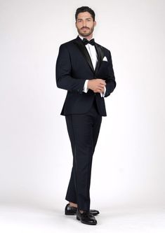 Look your best in the Dean Dark Navy Twill Tuxedo. This timeless design exudes sophistication and elegance for any formal occasion. Crafted from luxurious twill fabric, the dark navy shade adds an air of subtle class and exclusivity. Be the envy of the night in this classic, tailor-made piece. Elegant Suits With Notch Lapel, Elegant Tailored Suit, Elegant Fitted Suit For Formal Occasions, Tailored Elegant Tuxedo For Formal Occasions, Tailored Elegant Tuxedo For Formal Events, Elegant Tailored Tuxedo For Formal Occasions, Tailored Elegant Formal Tuxedo, Elegant Tailored Tuxedo For Formal Events, Elegant Tailored Suits For Evenings