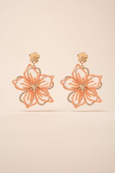 Make a statement with these beautiful Rhinestone Fabric Flower Earrings. These earrings are handmade with fabric flowers, embellished with shimmering rhinestones, creating a stunning and eye-catching look. Perfect for any special occasion or to add a touch of glamour to your everyday look. Shop now and add these unique earrings to your jewelry collection today! Size Length: 2.5 in (6.35 cm)Width: 2 in (5.08 cm) QualityEarrings are layered with two different flowers. Bottom flower with rhinestone Spring Party Beaded Earrings With Flower Shape, Spring Flower-shaped Beaded Earrings For Party, Spring Party Flower-shaped Beaded Earrings, Elegant Flower-shaped Beaded Earrings For Party, Gold Beaded Flower Earrings For Party, Orange Flower Shaped Earrings For Party, Orange Flower Earrings For Party, Fabric Flower Earrings, Rhinestone Fabric