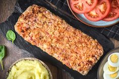 an image of food on the table with eggs and tomatoes