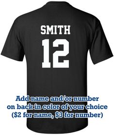 the back of a black shirt with white numbers on it and an image of a number 12