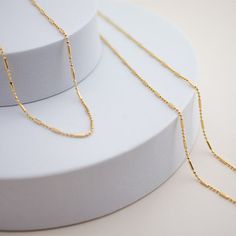 the namesake of our shape of you collection, this necklace embodies the concept behind the collection: taking it back to basics with simple, everyday, elevated pieces. 18kt gold BR gold filled available in 16" or 18" in length Minimalist 14k Gold Filled Charm Necklace For Layering, Everyday 14k Gold Filled Charm Necklace With Satellite Chain, Minimalist Charm Necklace With Cable Chain In Recycled Gold, Minimalist Charm Necklace In Recycled Gold On Cable Chain, Minimalist Charm Necklace In Recycled Gold, Minimalist 14k Gold-filled Charm Necklace With Delicate Chain, Everyday 14k Gold Bar Necklace With Adjustable Chain, Everyday 14k Gold Bar Necklace With Delicate Chain, Gold Bar Necklace With Delicate 14k Chain