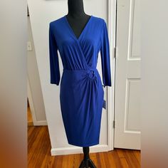 Nwt Beautiful Calvin Klein Atlantic Blue Dress. Size 4, V-Neck, Skirt Length From Waist To Hem Is 22”, Sleeve Length, 17”. Lovely Front Ruching And Silver Detail. Polyester And Spandex. Dry Clean Only. All Reasonable Offers Considered. Calvin Klein V-neck Party Dress, Elegant Blue Knee-length V-neck Dress, Blue Surplice Neckline Work Dress, Blue Surplice Neckline Dress For Work, Blue Formal Dress With Surplice Neckline, Formal Blue Dress With Surplice Neckline, Elegant Blue Calvin Klein Dress, Calvin Klein Blue Evening Dress, Calvin Klein Blue Formal Dress