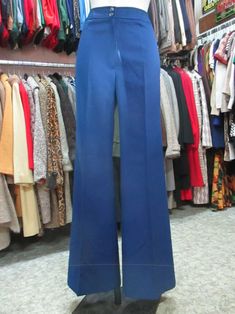 Amazing original 70s deadstock flared pants. NOS 70s pants/trousers. Made in France by "PEROCHE" (pics 7-8). Pure wool. Bright blue coloured. High waist and no pockets. Slim-fitting. Mint conditions. They fit size M about 8-10 US Size 40-42 EU Measurements: (lay flat and double waist and hips) Waist 29.9" hips 40.1" rise 11.4" inseam 34.2" bottom width 13" X 2 Misure: Vita 76 cms fianchi 102 cms cavallo 29 cms lungh. int.gamba 87 cms ampiezza zampa 33 cms X 2 In order to avoid any unpleasant mis Blue Stretch Wide-leg Jeans, High Waist Blue Flares, Retro Stretch Blue Flare Jeans, Vintage Wide Leg Stretch Pants, Vintage Stretch Wide Leg Pants, Retro Blue Straight Leg Flares, Retro Fitted Flare Jeans For Work, Fall Blue Wide Leg Flares, Retro Fitted Wide Leg Pants For Fall