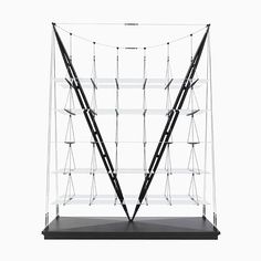 a black and white display case with multiple shelves