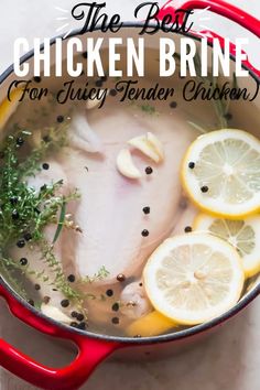 the best chicken brine with lemons and herbs in a red pot on a white table