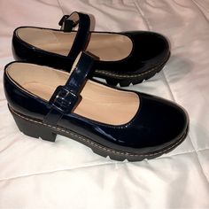 Very Nicely Made Dark Blue Patent Leather Mary Jane Style Of Shoes. Buckle Fastener On Outside Of Each Shoe. Chunky Rubber Soles Have 2-Inch Heel And 1 1/8” Thick Sole. Cushioned Insoles. Overall, These Shoes Look Sturdy And Nicely Crafted. Shoes Are New Without Tags Or Box. There Is No Name Brand On Them. There Is Also No Size Printed On Them. I Carefully Measured The Inside Of The Sole, From The Tip Of The Toe To The End Of The Heel. It Comes Out To 9 1/8”, Which Is The Measurement For Women’s Mary Janes Styled, Cheap Platform Heels, Thrift Shoes, Dark Blue Shoes, Dark Blue Heels, Thrifted Shoes, School Uniform Shoes, Y2k Shoes, Study Stationery