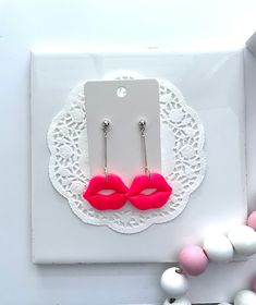 Lip glossy dangles are sure to get noticed! Listing includes: 1 pair of lip dangles. Select a color option during checkout. (Hot pink or red)   Please allow for slight differences in the final product due to different screen resolutions on phones, computers, tablets, etc. Thank you in advance for understanding.  NO RETURNS OR EXCHANGES ACCEPTED AT THIS TIME. Playful Pink Earrings For Party, Trendy Pink Hypoallergenic Earrings, Trendy Hypoallergenic Pink Earrings, Modern Pink Dangle Earrings, Trendy Pink Dangle Earrings, Jewelry Earrings Dangle, Color Options, Hot Pink, The Selection