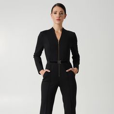 Black elegant jumpsuit Details: - long sleeves - V- neckline - front metal zipper - slim fitted silhouette - two front pockets - straight leg pants - elastic waist belt with metal buckle Fiber: jersey - viscose 80%, elastane-5%, polyester -15%. Color: Black For Size 36 EU / 2 US: inner leg - 33,5" (86 cm) You may feel free choosing the size. Just send us your measurements (bust, waist, hips, height).  We will define your correct size. Elegant Long Sleeve Jumpsuits And Rompers For Evening, Elegant Fitted Long Sleeve Jumpsuits And Rompers, Elegant Long Sleeve Fitted Jumpsuit, Fall Party Pantsuit With Long Sleeves, Long Sleeve Pantsuit For Fall Party, Elegant Jumpsuits And Rompers For Evening In Fall, Elegant Evening Jumpsuits And Rompers For Fall, Sleek Evening Suits With Long Sleeves, Sleek Long Sleeve Evening Suits