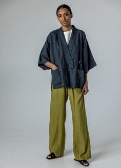 "Minimalist linen kimono jacket with raw-edge details. If you're interested in a longer medium-weight option with belt, check our jacket FUDO. STYLE DETAILS * Loose fit * Kimono sleeves & collar * Raw-edge details on the collar, sleeves & pockets * Patch pockets * Side slits * Tie strings inside and outside for better fit * French seams inside * Made from heavy-weight linen SIZES & COLORS IN PICTURES * Model 1 wears size m in color Dark Grey Heavy. She is 178 cm (5'10\"). Bust - 85 cm (33\"), waist - 63 cm (25\"), hips - 86 cm (34\"). * Model 2 wears size M in color Dark Grey Heavy. She is 176 cm (5'9\"). Bust - 81 cm (32\"), waist - 67 cm (26\"), hips - 90 cm (35\"). CUSTOMIZATION * Customization is possible, but such items are non-changeable & non-refundable * There is extra charge depen Casual Linen Kimono With Relaxed Fit, Casual Linen Kimono With Kimono Sleeves, Casual Linen Kimono For Spring, Spring Casual Linen Kimono, Spring Linen Outerwear With Kimono Sleeves, Linen Kimono With Relaxed Fit, Fashion Kimono, Haori Jacket, Linen Kimono