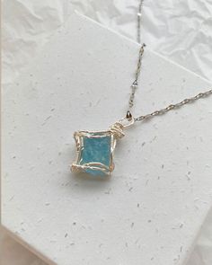 embrace the tranquil energy and serene beauty of our Aquamarine pendant necklace. This exquisite piece captures the calming essence of the ocean, perfect for bringing peace and elegance to your everyday style. Aquamarine Healing Properties: -Improves energy balance: Harmonizes the body's energy, creating a sense of equilibrium. -Enhances focus and clarity: Sharpens the mind, improving concentration and mental clarity. -Promotes physical and mental balance: Supports overall well-being by stabiliz Ocean-inspired Wire Wrapped Jewelry For Gifts, Ocean-inspired Wire Wrapped Jewelry As Gift, Ocean-inspired Wire Wrapped Jewelry Gift, Silver Birthstone Crystal Necklace, Silver Crystal Necklace With Birthstone, Minimalist Hand Wrapped Necklace As Gift, Minimalist Hand Wrapped Necklace For Gift, Minimalist Hand-wrapped Necklace For Gifts, Silver Hand Wrapped Mineral Crystal Necklaces