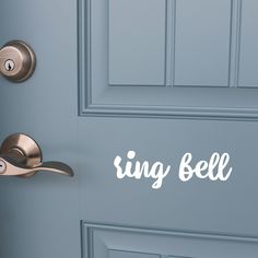 a blue door with the word sing bell on it's side and a pair of handles