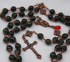 Lovely heirloom-quality traditional Catholic rosary, made by an artisan with 25 years experience in the craft.   Wonderful as a display piece and for those with stiff fingers who would benefit from a more comfortable use of prayer beads. Oversized Traditional Rosary 10mm copper cross gaud beads 8mm green aventurine ave beads Handmade Green Rosary, Handmade Artisan Rosary, Artisan Handmade Rosary, Green Rosary With 8mm Beads, Green Rosary With Round Beads As Gift, Green 8mm Beads Spiritual Rosary, Traditional Handmade Rosary For Healing, Handmade Green Rosary As A Gift, Green Aventurine Stone