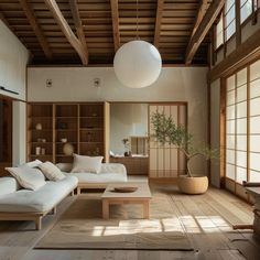 a living room filled with furniture and wooden floors