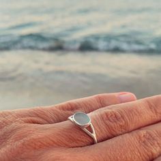 * The story  - Collecting beach treasures is my favourite! You wear something unique that I found in a beach of a Greek island! * Details - It's made of silver 925 and an aqua seaglass - Sea glass dimentions ~ 0,8×0,7 cm - ring size 6 1/4 US (1,65 cm diameter) - This listing is for one piece only. - I don't use wax technics so every piece has a little difference from the other. In the way that I finish them you will see that they are made from a human hand.  * Shipping Ready to ship in 1-2 business days via Hellenic post with tracking number.  * Packaging With the packaging you will receive a summer feeling because every piece is made for summer lovers. Ready to be gifted. Silver Sea Glass Ring For Beach, Minimalist Silver Rings For The Beach, Ocean-inspired Silver Rings For The Beach, Minimalist Sea Glass Jewelry For Beach, Human Hand, Greek Island, Summer Feeling, Multi Stone Ring, Greek Islands