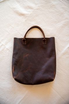 Large distressed brown leather tote. Simple handheld design with inside pocket Natural Leather Bag, Handmade Leather Bag, Large Purse, Brown Leather Totes, Leather Bags Handmade, Bag Handmade, Mothers Love, Leather Purse, Handmade Leather