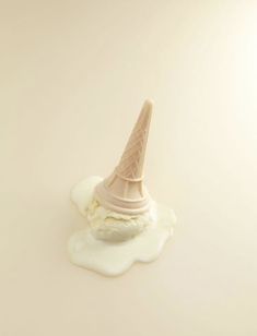 an ice cream cone sitting on top of a table