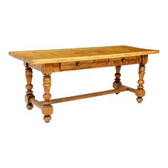 an old wooden table with two drawers on one side and three legs at the top