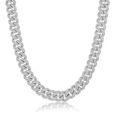 14K white gold diamond pave curb link chain from the Reis-Nichols Collection. The necklace features 2002 round brilliant cut diamonds weighing approximately 27 ctw. The chain measures 22" in length. White Gold Cuban Link Tennis Necklace, White Cuban Link Necklace In Cubic Zirconia, White Cuban Link Necklace With Cubic Zirconia, Iced Out Cuban Link Diamond Necklace In White Gold, Iced-out Chain Link Necklace In Diamond White, Iced Out Diamond White Chain Link Necklace, White Diamond Cuban Link Necklace, Diamond White Link Diamond Necklace, Diamond Cuban Link Necklace In Silver