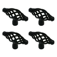 four black plastic knobs with wavy design on the top and one has a hole in the middle