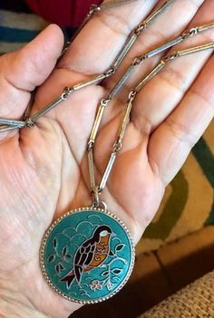 "Pretty Vintage Sarah Conventry Teal Enamel Cloisonné Bird Pendant on Silver Tone Long Linked Chain A beautiful vintage necklace. It measures approximately 24\" long with a 1\" x 1/2\" in diameter pendant. It is signed. It is in good preowned condition with light wear. I will give it a good proper jewelry cleaning before shipping and gift nicely 🎀" Vintage Enamel Necklace With Large Pendant, Vintage Enamel Necklaces With Lobster Clasp, Vintage Nickel-free Enamel Necklaces, Vintage Large Pendant Enamel Jewelry, Vintage Enamel Jewelry With Large Pendant, Vintage Enamel Necklace With Round Pendant, Vintage Enamel Round Pendant Necklace, Glen Cove, Old Hollywood Style