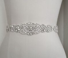 "Wedding Belt, Bridal Sash Belt - Crystal Pearl Wedding Sash Belt Applique size - approximately 21\" long and 1 7/8\" wide. (widest point). ** Self tie ribbon ties in the back. Total sash belt is measuring about 3.5 yards, 7/8\" width wide. ** Double face satin ribbon colors are available in White, Off White, Ivory, Black, Navy and Silver Grey, BLUSH Please select the sash color from the drop down menu **Due to all products being hand made, there will be a natural variance from product to produc Dress Sash Belt, Wedding Dress Sash Belt, Pearl Wedding Dress, Bridal Sash Belt, Diy Wedding Dress, Wedding Dress Sash, Wedding Belt, Wedding Dress Belt, Crystal Belt