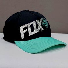 Rare! Effortlessly Cool, Sporty, And Chic Vintage Cap From Fox! Will Look Awesome With Any Outfit. Comes In Black With A Light Neon Green Brim. Desinged With A Distinct Fox Logo On The Crown, Structured Fit, Curved Bill, Five Panels, And Snapback Sizing Piece At Back. Very Comfy, Lightweight, And Breathable. Made From 100% Polyester. One Size Fits Most. Nwot From A Smoke-Free Home Black Six-panel Snapback Hat For Summer, Summer Sports Black Baseball Cap, Black Six-panel Summer Hat, Black Six-panel Trucker Hat For Summer, Black Summer Sports Hats, Sporty Black Summer Hats, Fox Logo, Vintage Fox, Vintage Cap