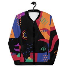 Add a little zing to your wardrobe with this vibrant All-Over Print Bomber Jacket. Wear it on a basic t-shirt, or layer it on top of a warm hoodie—it’ll look great either way. With a brushed fleece inside, and a relaxed unisex fit, this Bomber Jacket is just the stuff of the dreams, so be quick to grab yourself one! • 100% polyester • Brushed fleece fabric inside • Unisex fit • Overlock seams • Sturdy neck tape • Silver YKK zipper • 2 self-fabric pocketsSize guide XS S M L XL 2XL Chest (inches) Trendy Fleece Outerwear For Streetwear, Casual Fleece Windbreaker For Fall, Sporty Fall Track Jacket With Graphic Print, Retro Winter Outerwear For Layering, Retro Winter Layering Outerwear, Trendy Hooded Fleece Jacket For Streetwear, Urban Windbreaker With Graphic Print For Fall, Casual Multicolor Fleece Jacket For Winter, Urban Graphic Print Windbreaker For Fall