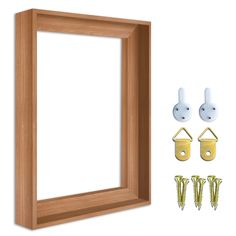 a wooden frame with screws and other items to make it look like a mirror