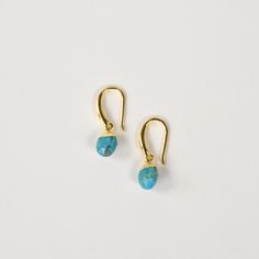 Turquoise Drop Earrings - Goldmakers Fine Jewelry Turquoise Dangle Jewelry With French Hook, Turquoise Gold Plated Dangle Jewelry, Turquoise Brass Hoop Earrings As Gift, Turquoise Brass Jewelry With Ear Wire, Turquoise Brass Hoop Earrings For Gift, Turquoise Jewelry With French Hook For Gift, Gift Turquoise Brass Hoop Earrings, Turquoise Teardrop Brass Jewelry, Turquoise Gold Plated Drop Earrings