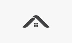 the letter a is made up of two black letters, one in the shape of a house