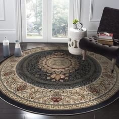 a living room area with a chair and rug