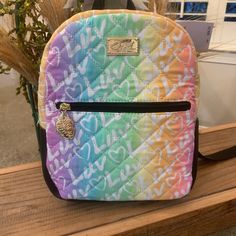 Nwt Betsey Johnson “Rainbow Luv” Pastel Mini Backpack Authentic Product Measures Approximately: Length 9.5 “ H By 7.5” By 3.5” W Regular Retail $68 Gold Hardware Main Zipper Closure And A Front Exterior Pocket Adjustable Straps Beautiful Betsey Lining Inside: No Pockets Great Backpack Bag! Perfect Size For Young Adult Authentic Product I Have Matching Weekender Bag If Interested In A Bundle... 3 Items Or More For Discount Ships Fast From A Smoke And Pet Free Home Rainbow Standard Backpack For Back To School, Trendy Rainbow Travel Bag, Casual Rainbow School Bag, Cute Rainbow School Bag, Cute Rainbow School Bags, Trendy Rainbow Bags For Everyday Use, Rainbow Bags With Adjustable Strap For Everyday Use, Everyday Multicolor Backpack With Adjustable Strap, Cute Colorful Bags For Everyday Use