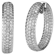 18 Karat White Gold Pave In and Out Diamond Hoop Earrings Featuring 8.31 Carat Total Weight Round Brilliant Cut Diamonds Of VS Clarity & G/H Color. 1.5 Inch Diameter. Open Heart Design At Back With Hinge Closure. Finished Weight Is 32.6 Grams. Luxury White Diamond-cut Hoop Earrings, Luxury White Gold Dazzling Hoop Earrings, Diamond Hoop Earrings, G H, Micro Pave, Jewelry Earrings Hoops, High Jewelry, Round Brilliant Cut Diamond, Large White