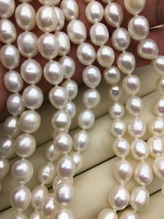 "pearl jewelry: long pearl necklace pearl body: AA+ pearl grade: AA+ pearl luster:high pearl shape: rice shape pearl size: 7.5-8.5mm--width pearl length: 65' pearl colour: white Back to Other Jewelry Section 01: \"Flameball Pearl\" Section： https://www.etsy.com/shop/WenPearls?section_id=22535705 02: \"Edison Pearl\" Section: https://www.etsy.com/shop/WenPearls?section_id=18890242 03: \"Keshi Pearl\" Section: https://www.etsy.com/shop/WenPearls?section_id=22535725 04: \"Various Baroque Pearl\" Se Pearl White Oval Beads Pearl Necklace, White Oval Beads Pearl Necklace Gift, White Oval Beads Pearl Necklace As Gift, White Oval Bead Pearl Necklace For Gift, White Oval Beads Pearl Necklace For Gift, White Oval Pearl Necklace, Elegant Pearl White Necklace With Oval Beads, Oval Pearl Necklace, Long Pearl Necklace