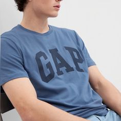 Straight Essy Fit Soft Knit Short Sleeves Crewneck Gap Logo Front Gap Tshirt Men, Gap Casual Relaxed Fit T-shirt, Gap Sporty Relaxed Fit Tops, Sporty Cotton Tops By Gap, Gap Cotton Tops With Logo Print, Gap Cotton T-shirt With Letter Print, Sporty Crew Neck Tops By Gap, Sporty Crew Neck Tops From Gap, Sporty Letter Print Tops By Gap