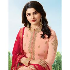 Display your beauty with simplicity & grace in this graceful peach colored anarkali suit, showcased by Prachi Desai. This semi stitched anarkali has got art silk fabric which has been made upscale with elegant embroidered work. The floor length makes the overall look more outstanding. Accompanied with santoon bottom, santoon lining and chiffon dupatta. Best suited for wedding functions, receptions and special occasions, where you want to be center of attraction. Team it with ethnic accessories a Festive Peach Anarkali Set With Intricate Embroidery, Bollywood Peach Anarkali Set With Intricate Embroidery, Semi-stitched Peach Sharara With Intricate Embroidery, Long Embroidered Pink Salwar Kameez, Peach Semi-stitched Floor-length Sharara, Floor-length Peach Sharara, Unstitched Anarkali Lehenga In Peach, Bollywood Traditional Wear With Intricate Embroidery In Peach, Peach Anarkali Lehenga Unstitched