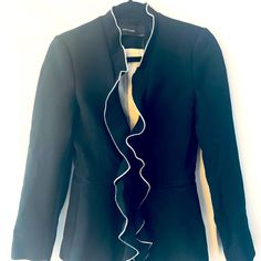 Zara- Black Blazer With Ruffle (Black With White Trim) Nwt - Never Worn, No Damage Fabric Is Thick And Of Exceptional Quality. Fit Is Trim - Shape Goes Slightly Inward At Waist New With Tags - Originally $150, I Paid $100 On Sale 49% Polyester, 48% Viscose, 3% Elastic *Pet Free/Smoke Free Home ! Elegant Ruffled Outerwear For Night Out, Spring Workwear Blazer With Ruffles, Chic Winter Blazer With Ruffles, Spring Blazer With Ruffles For Workwear, Zara Fitted Evening Outerwear, Spring Ruffled Blazer For Work, Chic Evening Outerwear With Ruffles, Ruffled Blazer For Formal Occasions, Chic Tailored Blazer With Ruffles