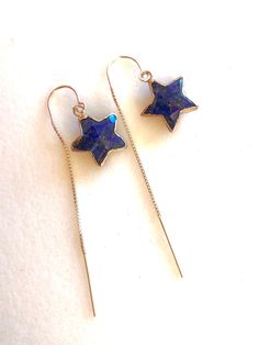 "Darling petite lapis lazuli stars on short \"U\" style sterling silver box chain threaders. Deep blue lapis lazuli 13 x 15 x 5mm two-sided silver electroplated stars suspended from short front .925 sterling silver threaders with \"U\" style to prevent loosing an earring. Front drop with star is 7/8\". Back drop is 2\". Delicate and sparkly star dangles!" Star-shaped Earrings With Adjustable Chain As Gift, Star Shaped Earrings With Adjustable Chain For Gifts, Sterling Silver Star-shaped Jewelry With Adjustable Chain, Sterling Silver Star Jewelry With Adjustable Chain, Sterling Silver Star Jewelry With Polished Finish, Sterling Silver Sapphire Star Jewelry, Blue Sterling Silver Star Earrings, Blue Star-shaped Sterling Silver Earrings, Dainty Blue Jewelry With Star Charm