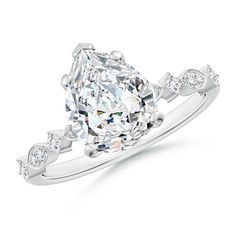 an oval cut diamond engagement ring with side stones