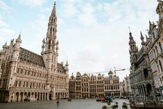 an old european city with tall buildings and spires