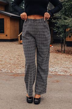 - These new pants are boss babe chic!
 - Unlined black and white plaid material
 - A waistline with belt loops, a hidden zip fly, and hook closure
 - Pleated detail
 - Functional side pockets
 - A relaxed silhouette that ends in straight hemlines Chic Plaid Bottoms For Business Casual, Black Wide Leg Bottoms With Houndstooth Pattern, Plaid Workwear Bottoms With Belt Loops, Casual Black Houndstooth Pants, Black Houndstooth Pants For Office, Casual Black Pants With Houndstooth Pattern, Black Houndstooth Office Pants, Chic Plaid Houndstooth Pants, Black Houndstooth Trousers