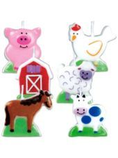 three farm animals and one pig are standing in front of each other